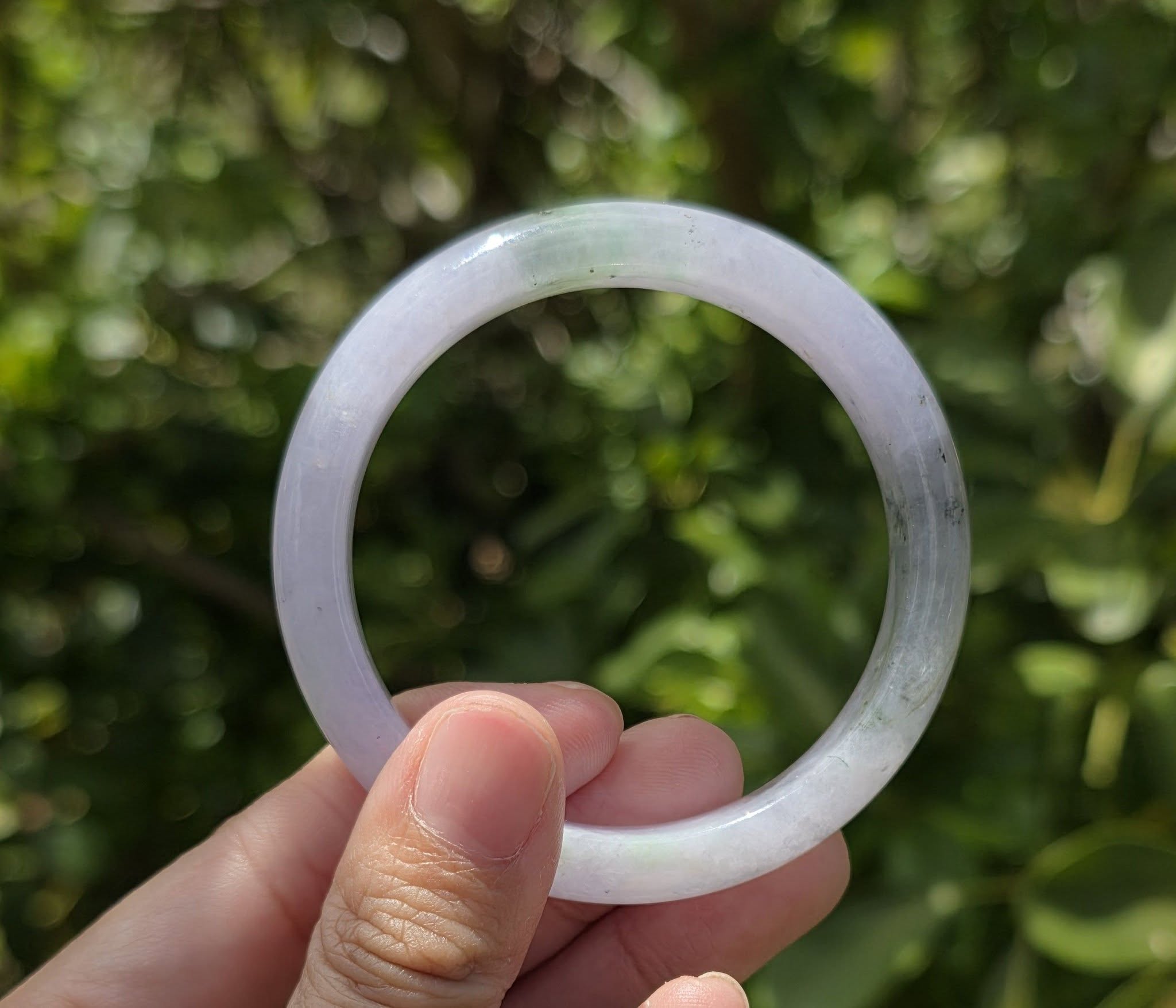Lavender jade bangle in natural light